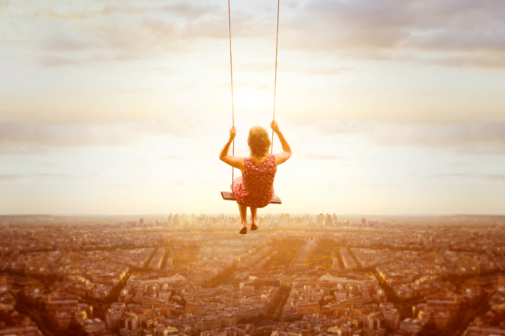 Photo of woman on swing